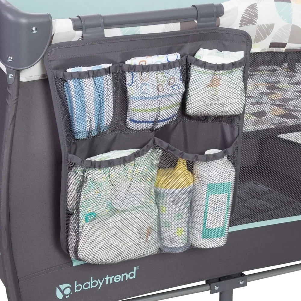 NEW.Trend-E Portable and Compact Newborn Nursery Center Pack and Play Baby Crib with Parent Organizer, Bassinet, and Travel Bag